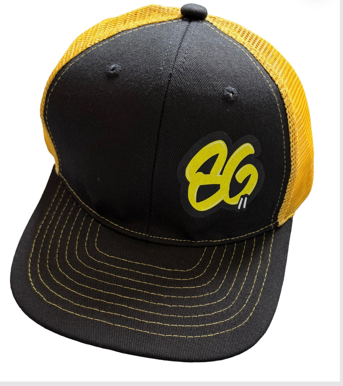 Charlie Nesbitt 86 Black and Orange Flat Peak Cap